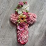 Cruz tonos rosas
